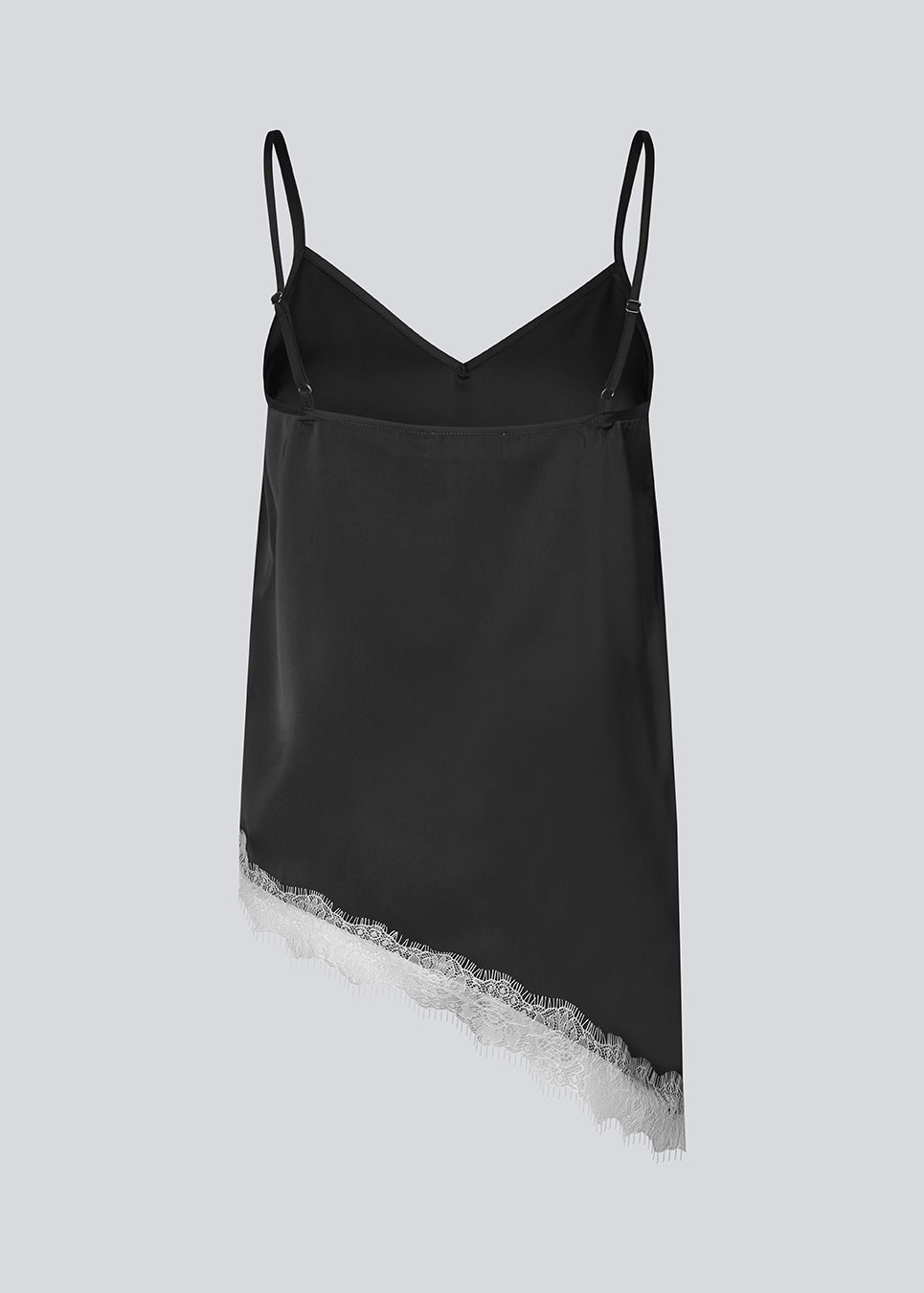 Satin slip top with contrast lace trim. The AlinkaMD Top features spaghetti straps, a V-neckline, and an asymmetrical hem that is longer on one side. An elegant top, perfect on its own or for layered styling.