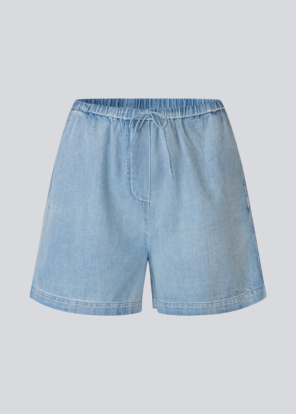 Light cotton denim shorts. The AlvarMD Shorts feature adjustable drawstrings at the waist and a relaxed, loose fit for all-day comfort. Classic details and lightweight fabric make them perfect for laid-back summer looks.