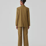 Oversized blazer with a drapy fit. AnkerMD blazer has collar and notch lapels with a single button closure. Flap welt front pockets. Slits on cuffs and single back vent. Lined.  The model is 177 cm and wears a size S/36. Style the blazer with matching pants in the same color: AnkerMD pants