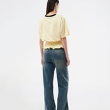 T-shirt with Brazil logo and scrunch detailing at the waist. The AnsgarMD T-Shirt features contrast trim on the round neckline, short sleeves, and a ruffled hem. A feminine and modern T-shirt, perfect for relaxed yet stylish everyday looks.