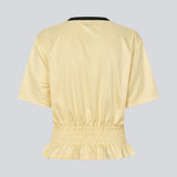 T-shirt with Brazil logo and scrunch detailing at the waist. The AnsgarMD T-Shirt features contrast trim on the round neckline, short sleeves, and a ruffled hem. A feminine and modern T-shirt, perfect for relaxed yet stylish everyday looks.