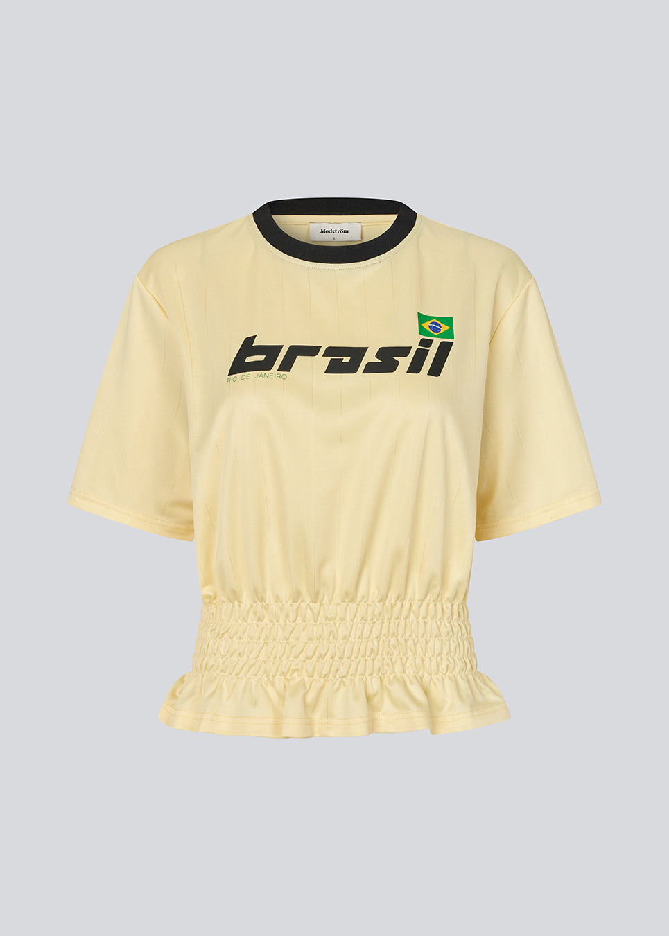 T-shirt with Brazil logo and scrunch detailing at the waist. The AnsgarMD T-Shirt features contrast trim on the round neckline, short sleeves, and a ruffled hem. A feminine and modern T-shirt, perfect for relaxed yet stylish everyday looks.