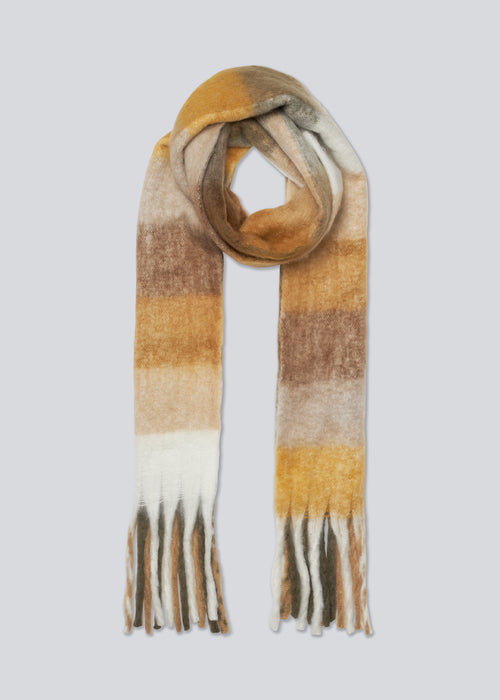 Oversized and snug scarf with brushed finish in a colourful mix with fringes along the shorter sides.