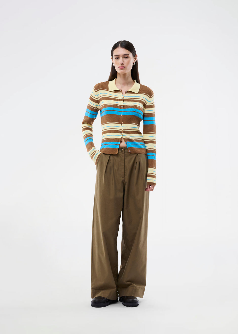 Long-sleeve cardigan with a polo collar and stripes. The AslanMD Cardigan is made from ribbed 100% organic cotton with elastic for a snug and comfortable fit. Perfect for layering or as an elegant everyday favorite.
 