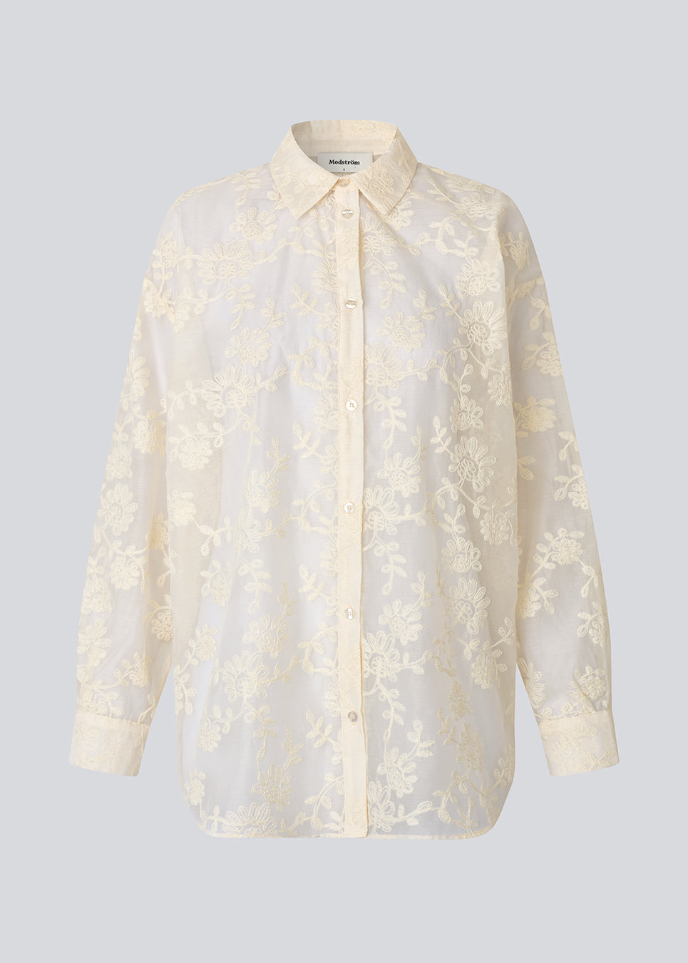 Long shirt in heavyweight mesh with embroidery. The BabaraMD Long Shirt features a collar, button closure, and cuffed sleeves - an elegant and trendy statement top that creates a modern, polished look.