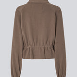 Fleece jacket with modern, sporty details. The BadraMD Jacket is made from 100% recycled polyester and features a zip closure, subtle chest logo, elasticated cuffs, and an adjustable drawstring at the waist.