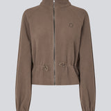 Fleece jacket with modern, sporty details. The BadraMD Jacket is made from 100% recycled polyester and features a zip closure, subtle chest logo, elasticated cuffs, and an adjustable drawstring at the waist.