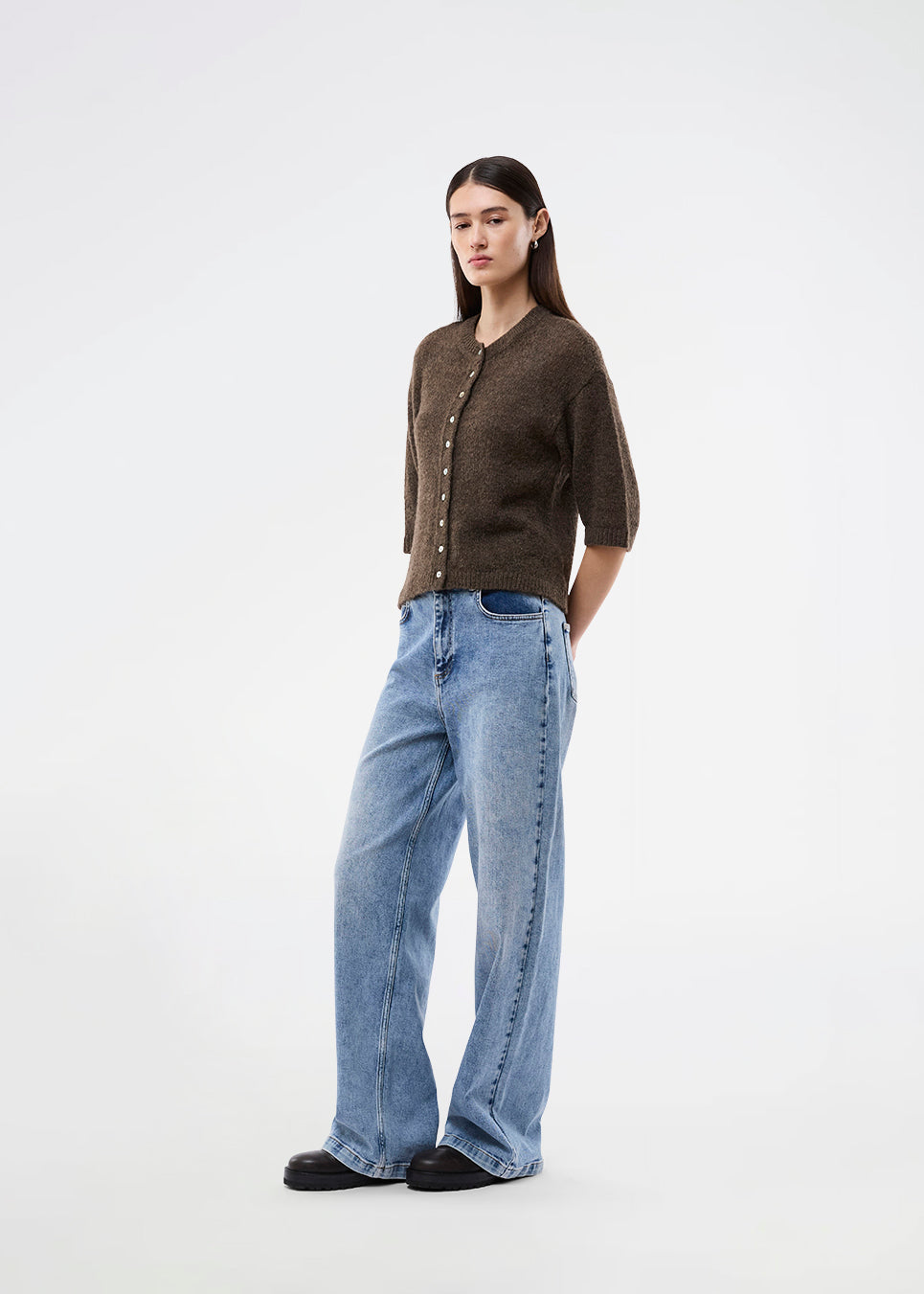 3/4-sleeve cardigan in lightweight, soft knit. The BailorMD Cardigan features ribbed trims, a button closure, and a relaxed fit – perfect worn alone or as a trendy layering piece.