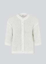 3/4-sleeve cardigan in lightweight, soft knit. The BailorMD Cardigan features ribbed trims, a button closure, and a relaxed fit – perfect worn alone or as a trendy layering piece.