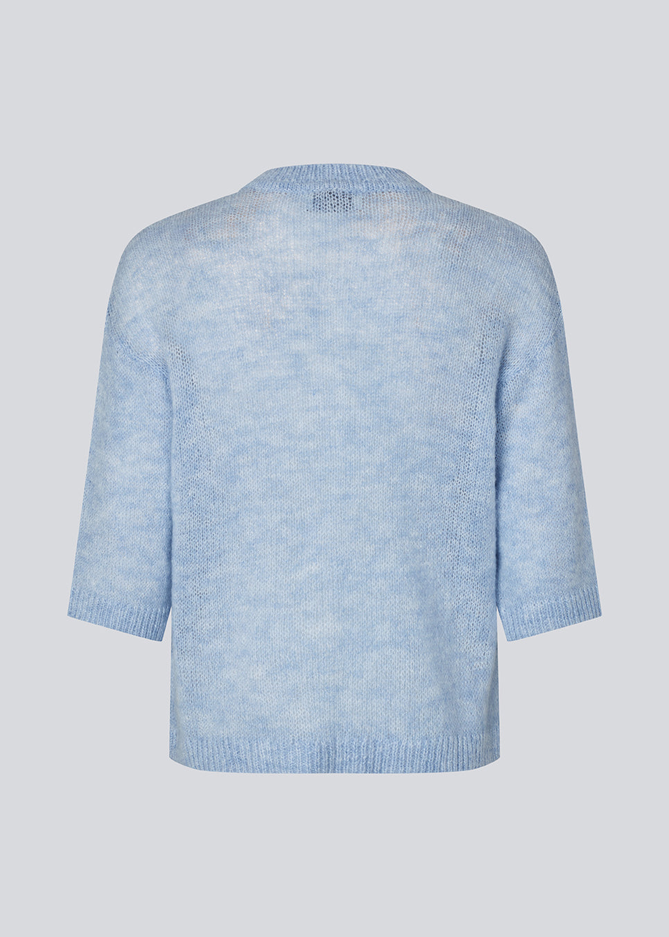 3/4-sleeve cardigan in lightweight, soft knit. The BailorMD Cardigan features ribbed trims, a button closure, and a relaxed fit – perfect worn alone or as a trendy layering piece.