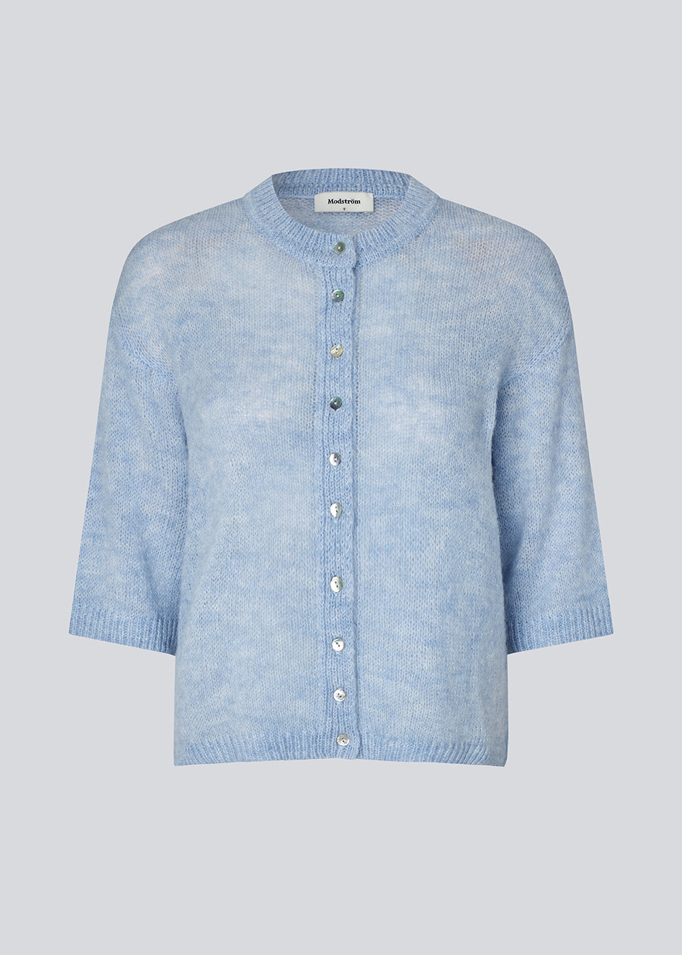 3/4-sleeve cardigan in lightweight, soft knit. The BailorMD Cardigan features ribbed trims, a button closure, and a relaxed fit – perfect worn alone or as a trendy layering piece.