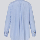 Long shirt with pinstripes. The BalouMD Shirt features unique silver buttons, a collar, cuffs, and a longer back hem - a sleek and modern statement top, made from 100% recycled polyester.