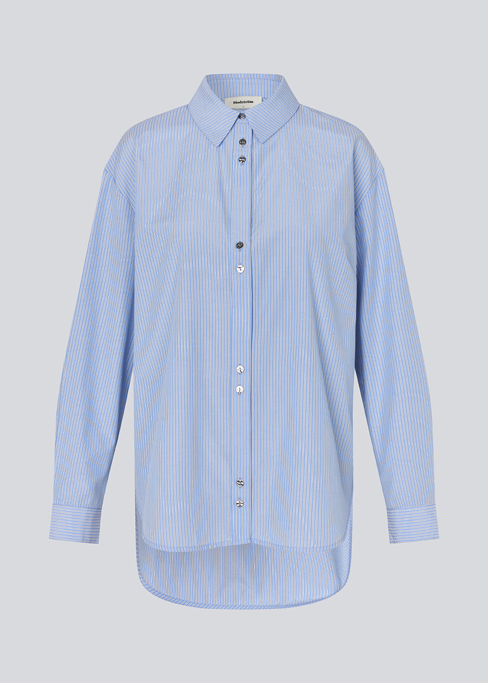 Long shirt with pinstripes. The BalouMD Shirt features unique silver buttons, a collar, cuffs, and a longer back hem - a sleek and modern statement top, made from 100% recycled polyester.