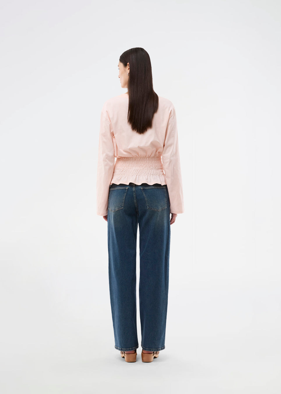 Long-sleeve T-shirt with smocked waist detail. The BariMD LS T-Shirt features a logo on the front, a round neckline, and combines a sporty look with feminine, flattering details -&nbsp;a trendy and effortless everyday favorite.