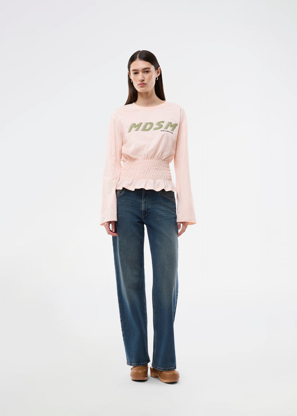 Long-sleeve T-shirt with smocked waist detail. The BariMD LS T-Shirt features a logo on the front, a round neckline, and combines a sporty look with feminine, flattering details -&nbsp;a trendy and effortless everyday favorite.