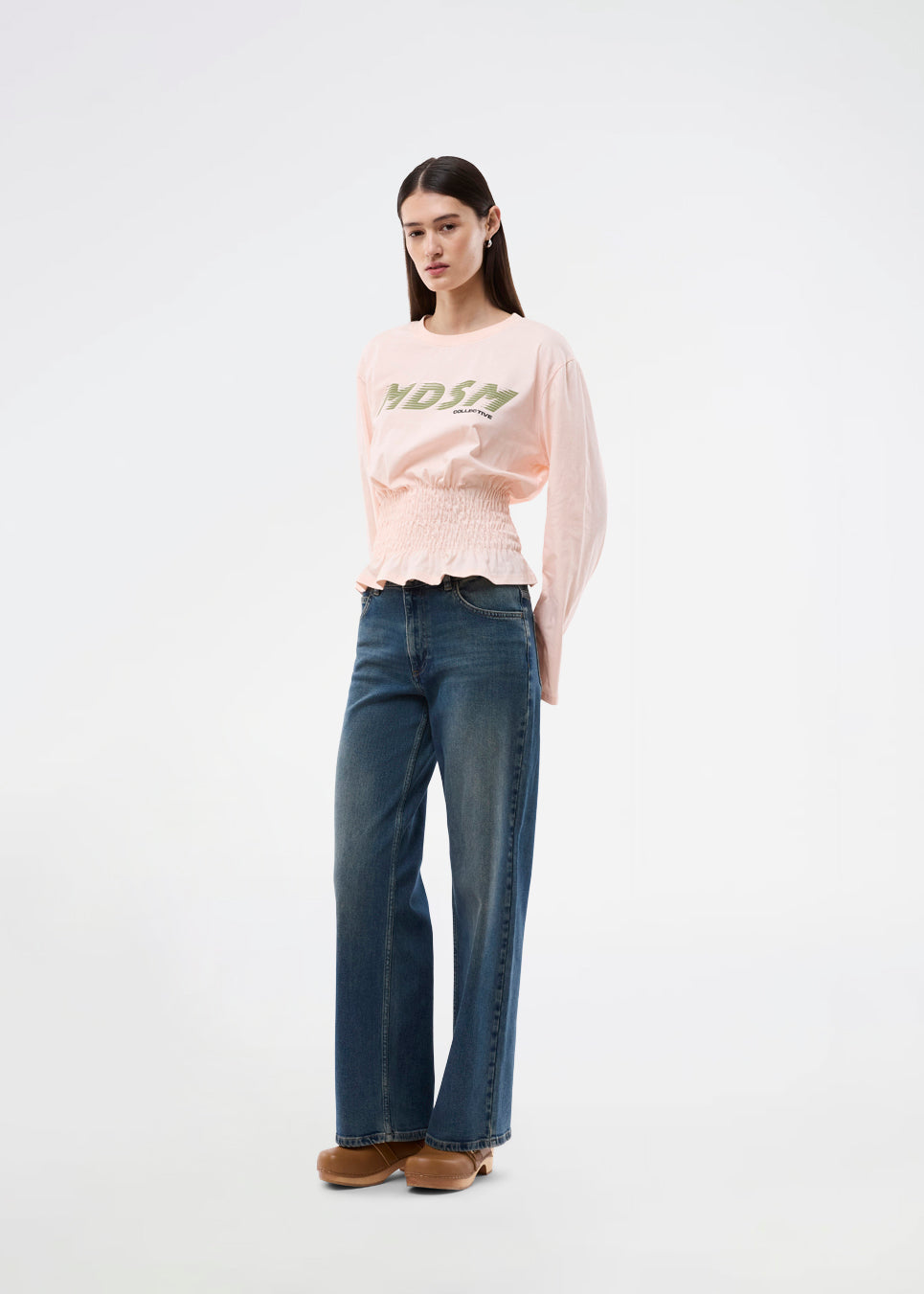 Long-sleeve T-shirt with smocked waist detail. The BariMD LS T-Shirt features a logo on the front, a round neckline, and combines a sporty look with feminine, flattering details -&nbsp;a trendy and effortless everyday favorite.
