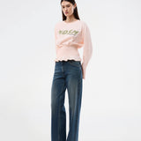 Long-sleeve T-shirt with smocked waist detail. The BariMD LS T-Shirt features a logo on the front, a round neckline, and combines a sporty look with feminine, flattering details -&nbsp;a trendy and effortless everyday favorite.