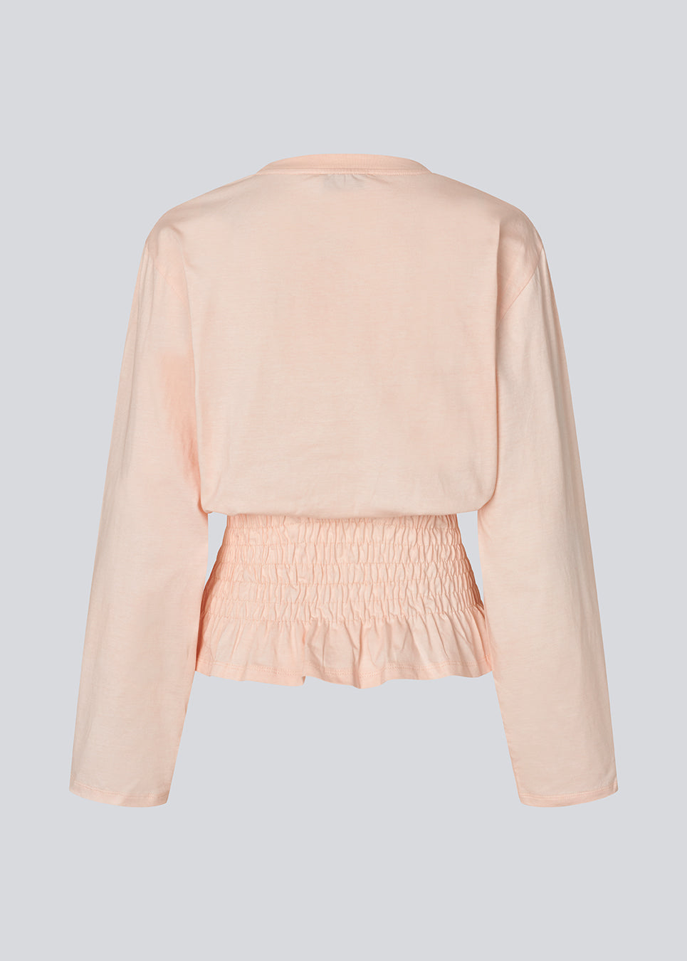 Long-sleeve T-shirt with smocked waist detail. The BariMD LS T-Shirt features a logo on the front, a round neckline, and combines a sporty look with feminine, flattering details -&nbsp;a trendy and effortless everyday favorite.