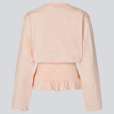 Long-sleeve T-shirt with smocked waist detail. The BariMD LS T-Shirt features a logo on the front, a round neckline, and combines a sporty look with feminine, flattering details -&nbsp;a trendy and effortless everyday favorite.