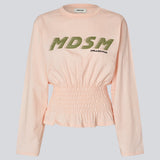 Long-sleeve T-shirt with smocked waist detail. The BariMD LS T-Shirt features a logo on the front, a round neckline, and combines a sporty look with feminine, flattering details -&nbsp;a trendy and effortless everyday favorite.