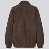 Cool suede jacket with a relaxed look. Barkmd jacket is designed in an oversized fit with a classic collar, concealed snap-button closure, and ribbed cuffs and hem for a modern bomber-inspired silhouette. Large front pockets complete the functional design, making it a stylish wardrobe staple you'll reach for season after season.