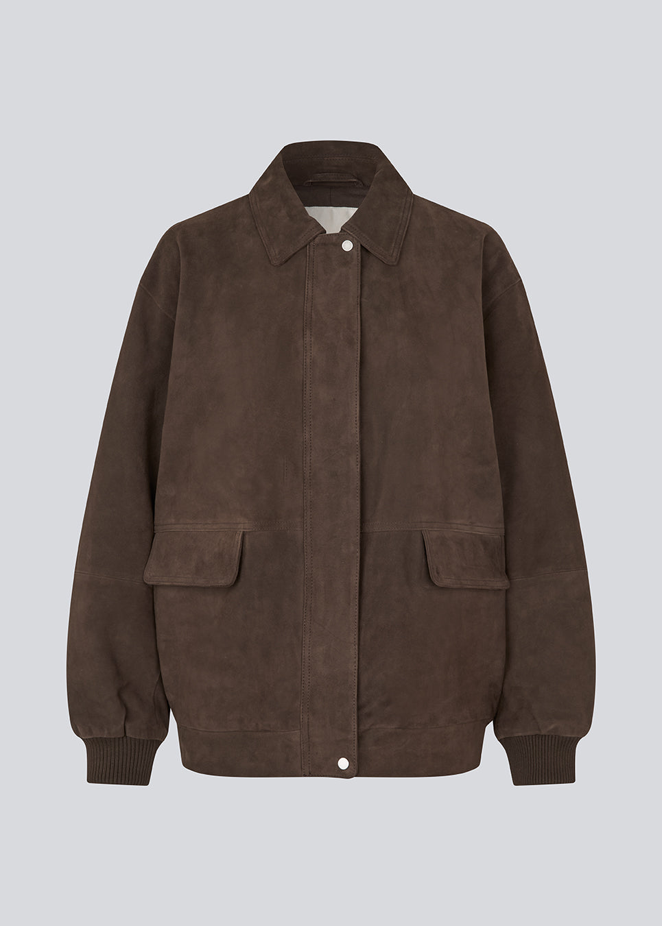 Cool suede jacket with a relaxed look. Barkmd jacket is designed in an oversized fit with a classic collar, concealed snap-button closure, and ribbed cuffs and hem for a modern bomber-inspired silhouette. Large front pockets complete the functional design, making it a stylish wardrobe staple you'll reach for season after season.
