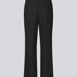 Classic tailored trousers with lace-up detail. The Beamd Pants feature straight legs, a zip closure, and an edgy lace-up detail at the front. The clean cut creates a sharp, modern look with a twist. Made from 78% recycled polyester for a more responsible choice.