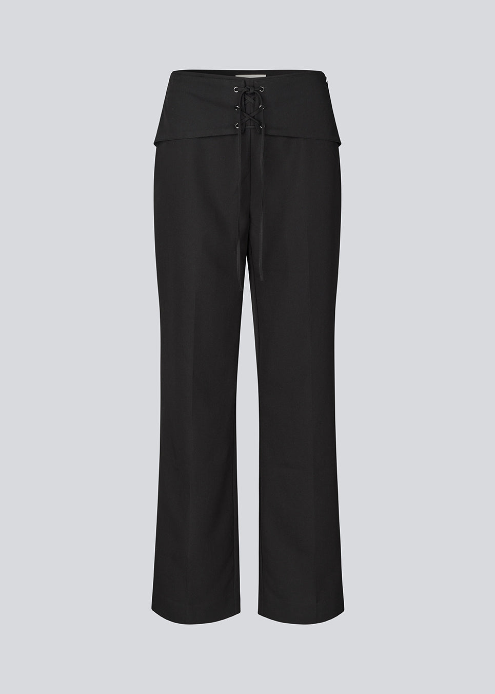 Classic tailored trousers with lace-up detail. The Beamd Pants feature straight legs, a zip closure, and an edgy lace-up detail at the front. The clean cut creates a sharp, modern look with a twist. Made from 78% recycled polyester for a more responsible choice.