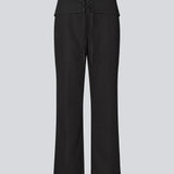 Classic tailored trousers with lace-up detail. The Beamd Pants feature straight legs, a zip closure, and an edgy lace-up detail at the front. The clean cut creates a sharp, modern look with a twist. Made from 78% recycled polyester for a more responsible choice.
