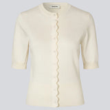 Feminine short-sleeved cardigan in lightweight knit. The Bennamd SS Cardigan features classic details such as ribbed trims, a button closure, and a round neckline, with a delicate wavy edge along the button placket for an elegant touch.