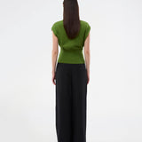 Feminine sleeveless cardigan in lightweight, luxurious knit. The Bernadette MD Vest features elegant ribbed trims, a stylish button closure, and a round neckline, with a tailored fit and an extra-wide ribbed waistband. Made from soft, 100% organic cotton – a timeless wardrobe must-have.