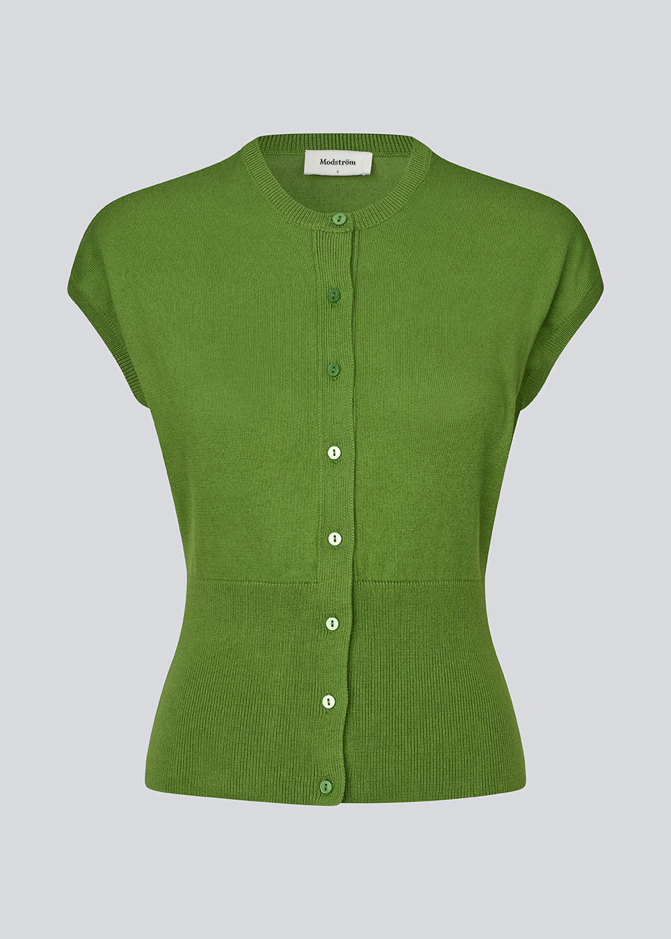 Feminine sleeveless cardigan in lightweight, luxurious knit. The Bernadette MD Vest features elegant ribbed trims, a stylish button closure, and a round neckline, with a tailored fit and an extra-wide ribbed waistband. Made from soft, 100% organic cotton – a timeless wardrobe must-have.