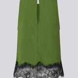 Edgy top with lace detailing. The BirkMD Top features a high, round neckline, is sleeveless, and has a relaxed fit - the contrasting lace adds a cool and feminine touch, made from 100% recycled polyester.