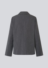 Classic blazer with elegant pinstripes. The BirnaMD Blazer has a timeless and sleek look, featuring details such as a notched collar, side pockets, and button closure - a modern and polished wardrobe must-have.