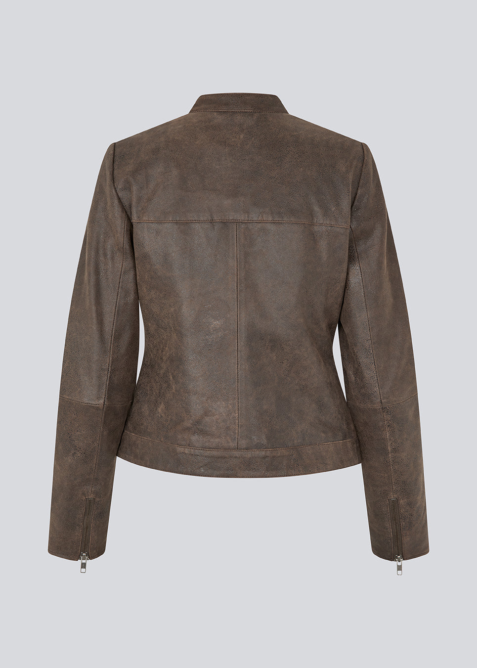 Classic leather jacket with a timeless biker-inspired look. Bobbiemd jacket is designed in a fitted silhouette with a stand collar, zip-front closure, and subtle metal snap buttons at the neckline and hem. A zipped chest pocket and zip details at the cuffs add a modern, edgy touch. A versatile wardrobe staple that can easily be styled for both casual and more polished looks.
