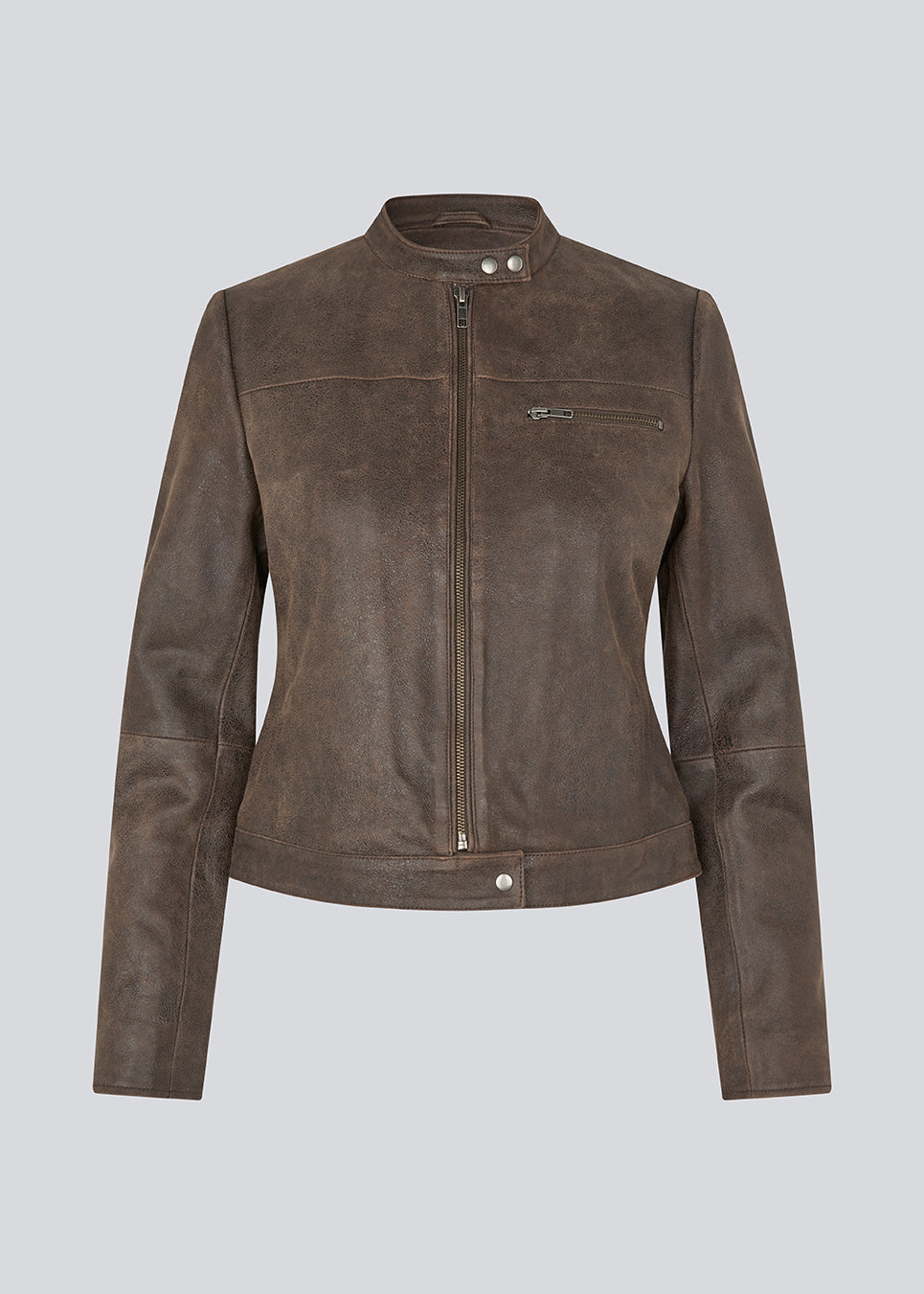 Classic leather jacket with a timeless biker-inspired look. Bobbiemd jacket is designed in a fitted silhouette with a stand collar, zip-front closure, and subtle metal snap buttons at the neckline and hem. A zipped chest pocket and zip details at the cuffs add a modern, edgy touch. A versatile wardrobe staple that can easily be styled for both casual and more polished looks.