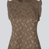 Elegant top in textured, patterned fabric. The Briannamd Top features feminine details such as a tailored fit, is sleeveless with ruffle trim, and designed with a round neckline and a back zip closure. Made from 100% recycled polyester.