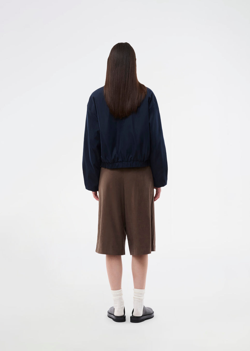 Bermuda shorts in soft faux suede. The BritneyMD Long Shorts are a super cool and edgy style with a knee-length cut, relaxed fit, and elastic waistband - a chic and comfortable must-have for effortless summer looks.