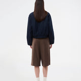 Bermuda shorts in soft faux suede. The BritneyMD Long Shorts are a super cool and edgy style with a knee-length cut, relaxed fit, and elastic waistband - a chic and comfortable must-have for effortless summer looks.
