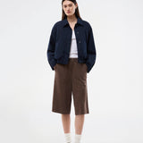 Bermuda shorts in soft faux suede. The BritneyMD Long Shorts are a super cool and edgy style with a knee-length cut, relaxed fit, and elastic waistband - a chic and comfortable must-have for effortless summer looks.