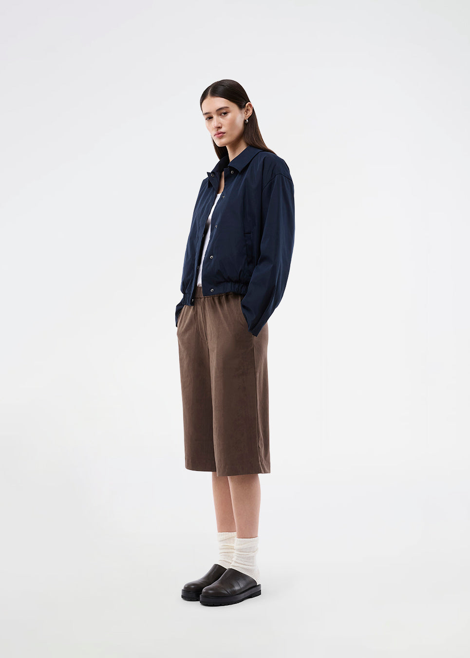 Bermuda shorts in soft faux suede. The BritneyMD Long Shorts are a super cool and edgy style with a knee-length cut, relaxed fit, and elastic waistband - a chic and comfortable must-have for effortless summer looks.