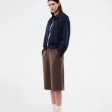 Bermuda shorts in soft faux suede. The BritneyMD Long Shorts are a super cool and edgy style with a knee-length cut, relaxed fit, and elastic waistband - a chic and comfortable must-have for effortless summer looks.