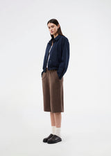 Bermuda shorts in soft faux suede. The BritneyMD Long Shorts are a super cool and edgy style with a knee-length cut, relaxed fit, and elastic waistband - a chic and comfortable must-have for effortless summer looks.