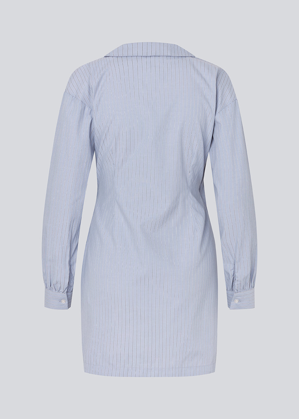 Short asymmetric dress with shirt-inspired details. The BrodieMD Dress features a collar, V-neckline, cuffs, and a wrap-style detail with buttons and pleats - a trendy and flattering style that creates a modern, effortless look.