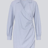 Short asymmetric dress with shirt-inspired details. The BrodieMD Dress features a collar, V-neckline, cuffs, and a wrap-style detail with buttons and pleats - a trendy and flattering style that creates a modern, effortless look.