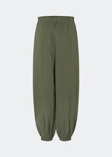 Relaxed trousers with a modern balloon silhouette. Caishamd pants are crafted from a lightweight fabric with an elasticated paperbag waistband and adjustable drawstring for a comfortable fit. The wide legs are gathered with elastic at the ankles, creating a voluminous, contemporary shape. Designed with slanted side pockets and a single welt pocket at the back, they combine functionality with a clean, minimal look. Pair them with a shirt or a lightweight knit for effortless everyday and weekend styling.