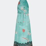 Elegant maxi dress featuring an artistic print and feminine details. Carinamd print dress is crafted from a lightweight, smooth fabric with a high halterneck neckline that fastens at the back of the neck and a self-tie belt at the waist to define the silhouette. The long, flowing fit is finished with a contrasting lace trim at the hem, adding a refined and romantic touch. A standout dress, perfect for summer parties, weddings, and other special occasions.