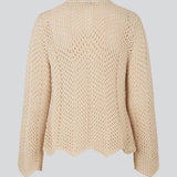 Jumper in crocheted style made from a soft organic cotton. CaryMD o-neck has a relaxed fit with a round neck with wavy hem, long wide sleeves and detailed finishes. The model is 175 cm and wears a size S/36.