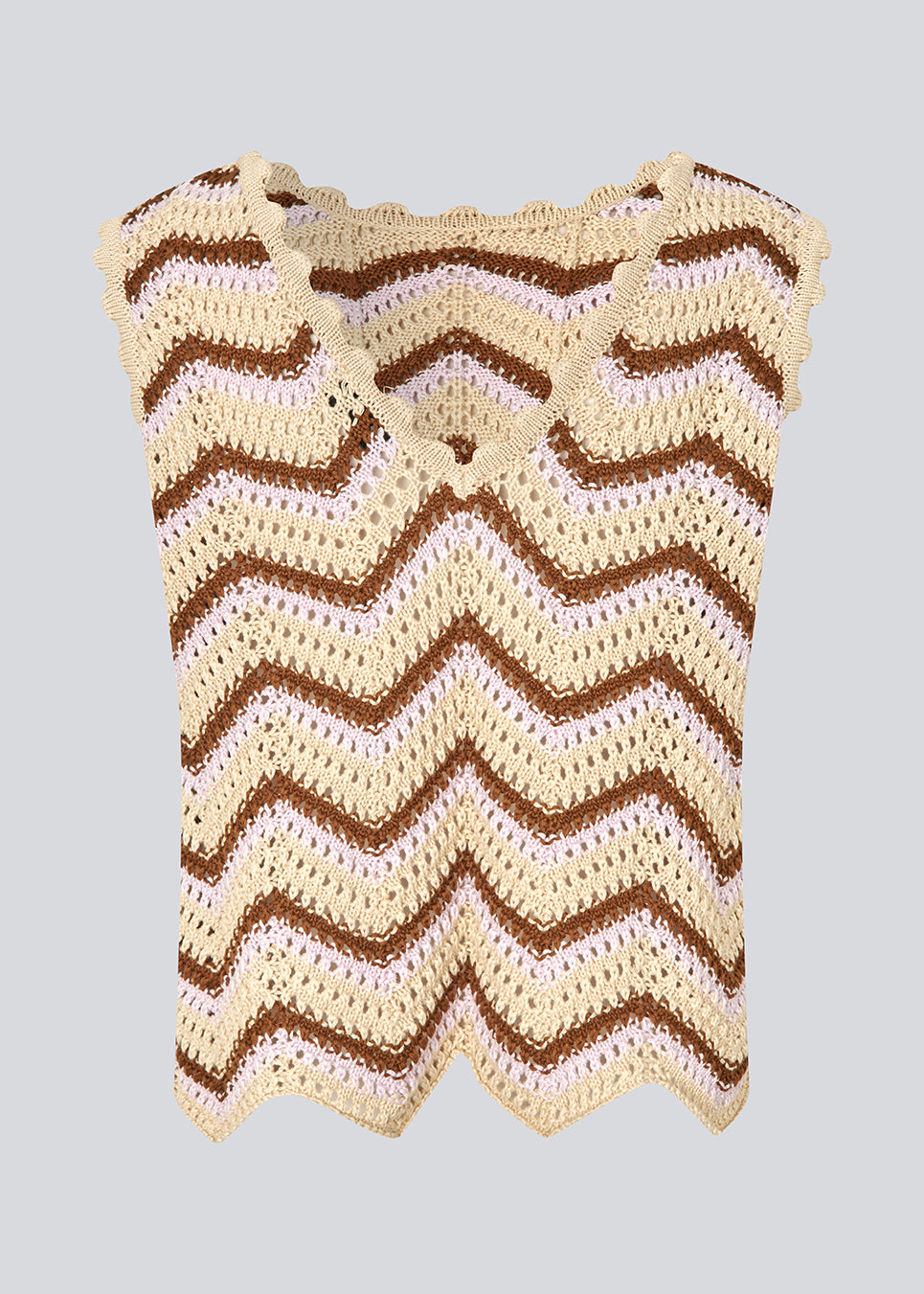 Crochet top without sleeves in a multicolored organic cotton. CaryMD top has detailed trimmings and a deep v-neckline in the back.