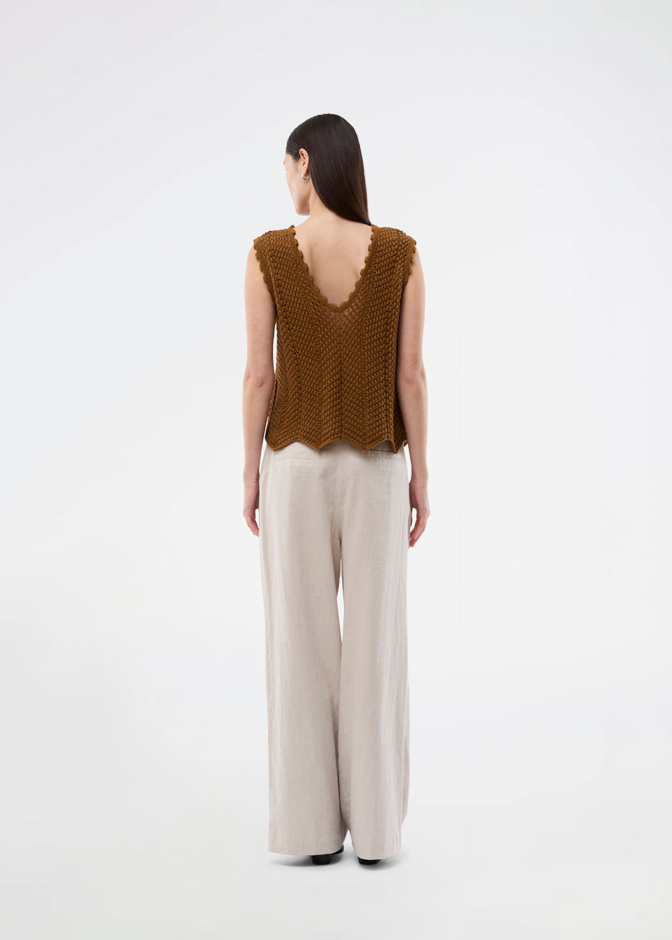 Crochet top without sleeves in a multicolored organic cotton. CaryMD top has detailed trimmings and a deep v-neckline in the back. 